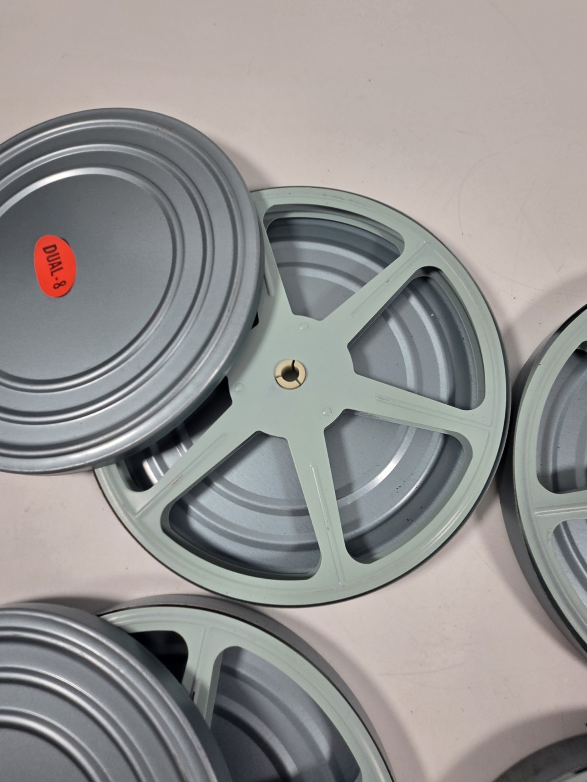 Set Of 4 Vintage Dual-8 8mm 7 in metal reel and can Old School Tv Nostalgia