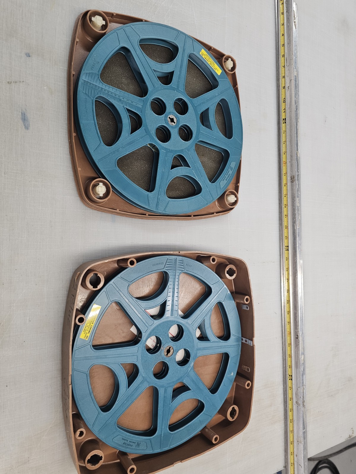 16mm film reels, metal, plastic, with 2-reel case gray, blue