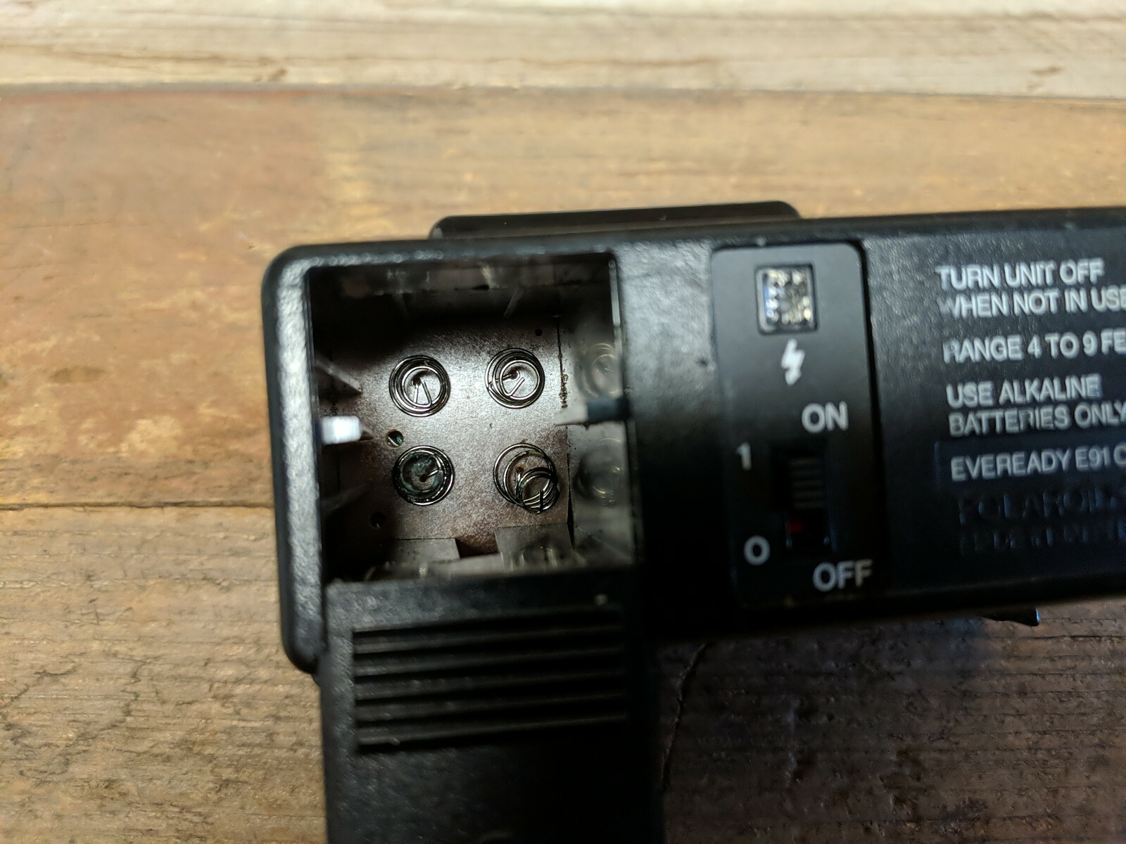 Used Polaroid SX-70 black rainbow stripe flash Parts or Repair Non Funtioning