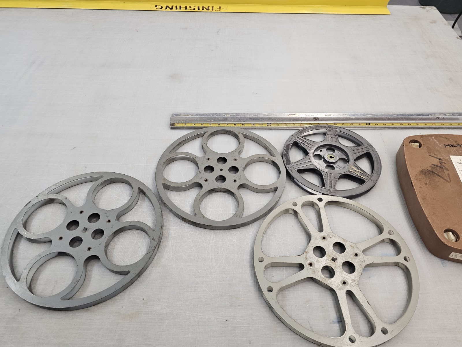 16mm film reels, metal, plastic, with 2-reel case gray, blue