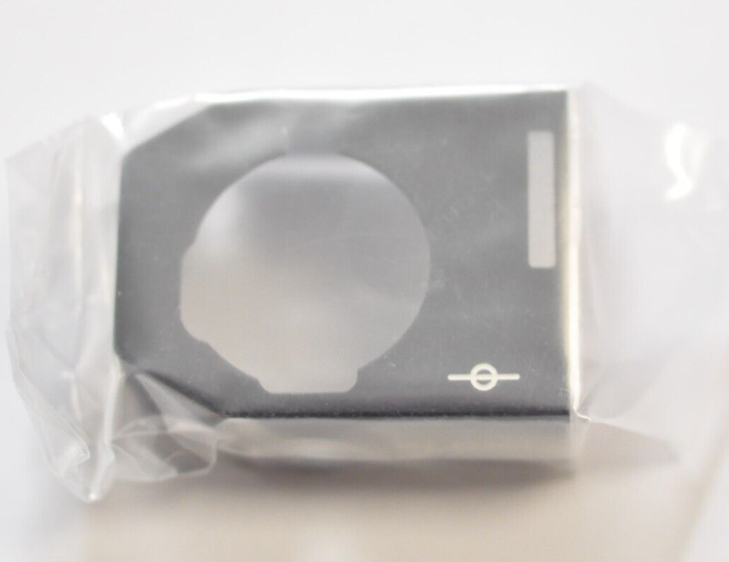 Canon F-1 / F-1n rewind side top cover. NOS. I