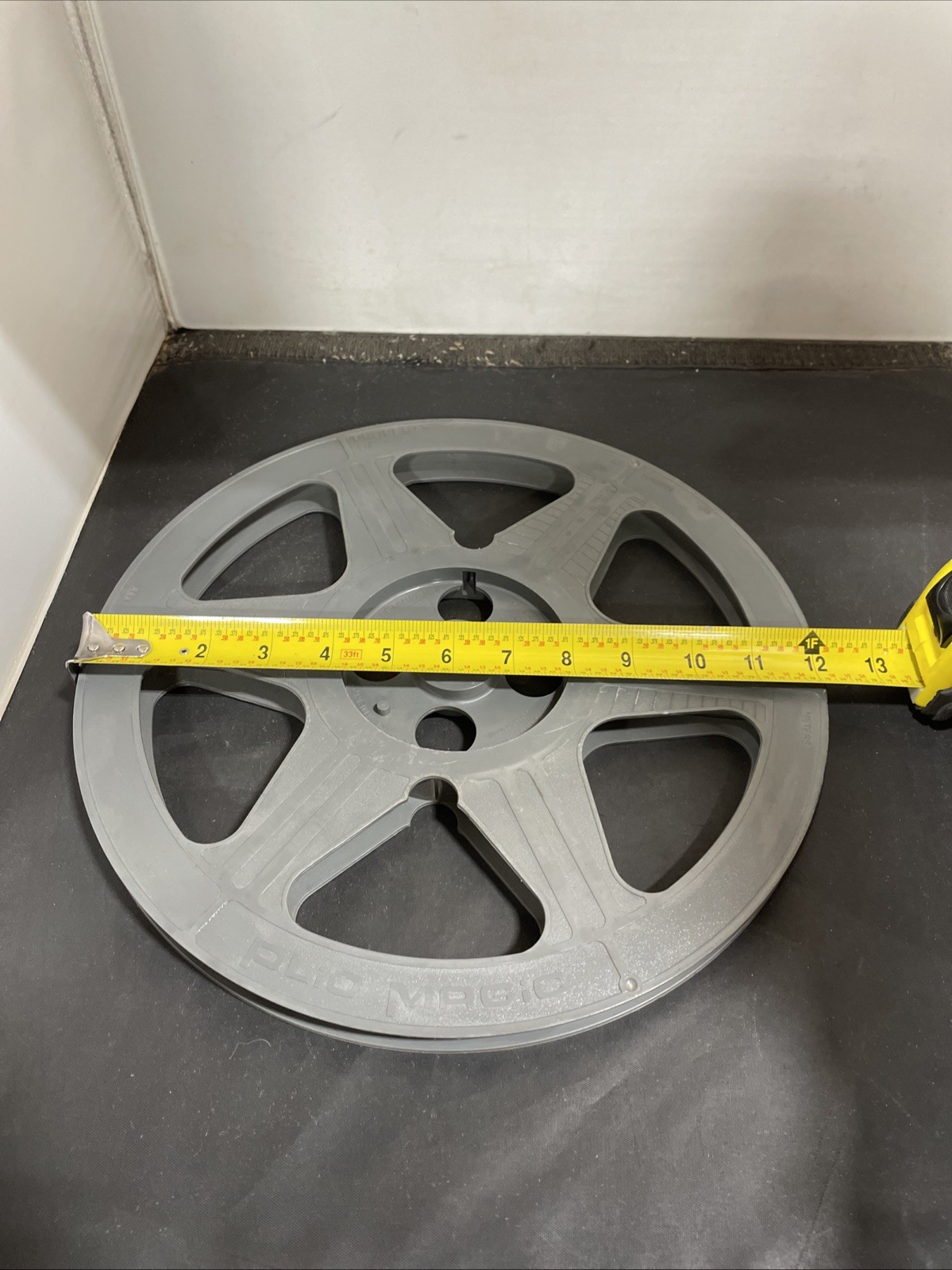 Plastic Reel for Decoration Vintage Grey 12″ Across – Pre-Owned