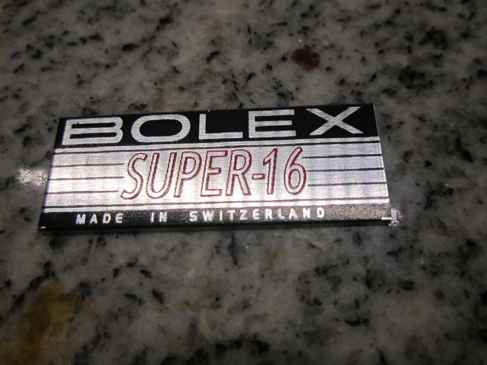 BOLEX RED ‘SUPER-16′ LOGO PLATE BADGE’ (Glue-In) for BOLEX 16mm movie camera