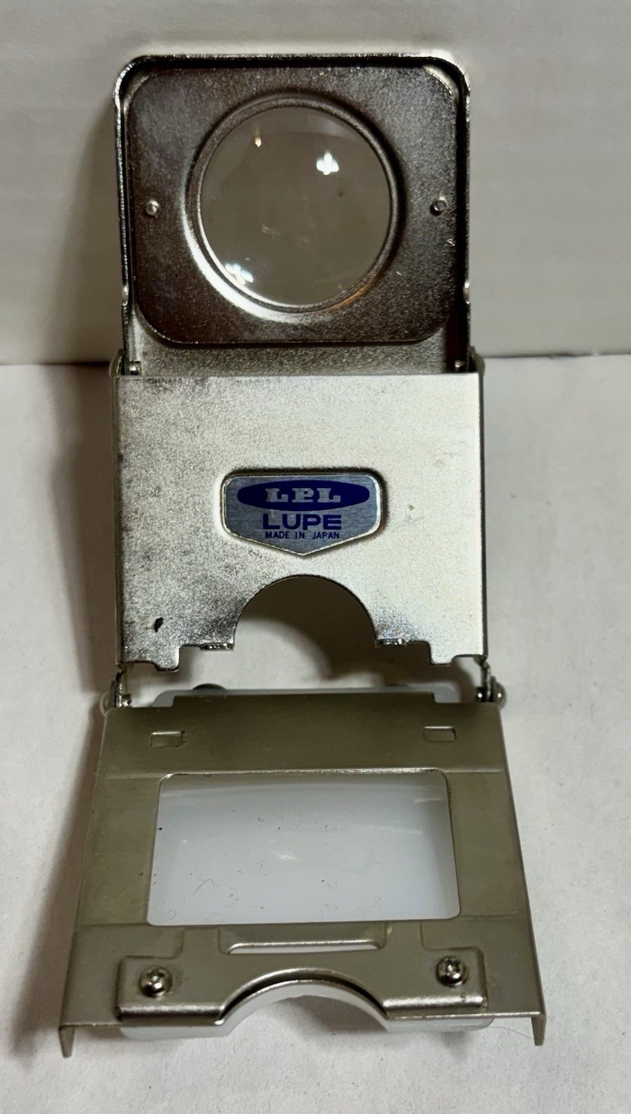 LPL NEGA LUPE Metal Folding Loupe for 35mm Negatives with Pouch & Instructions