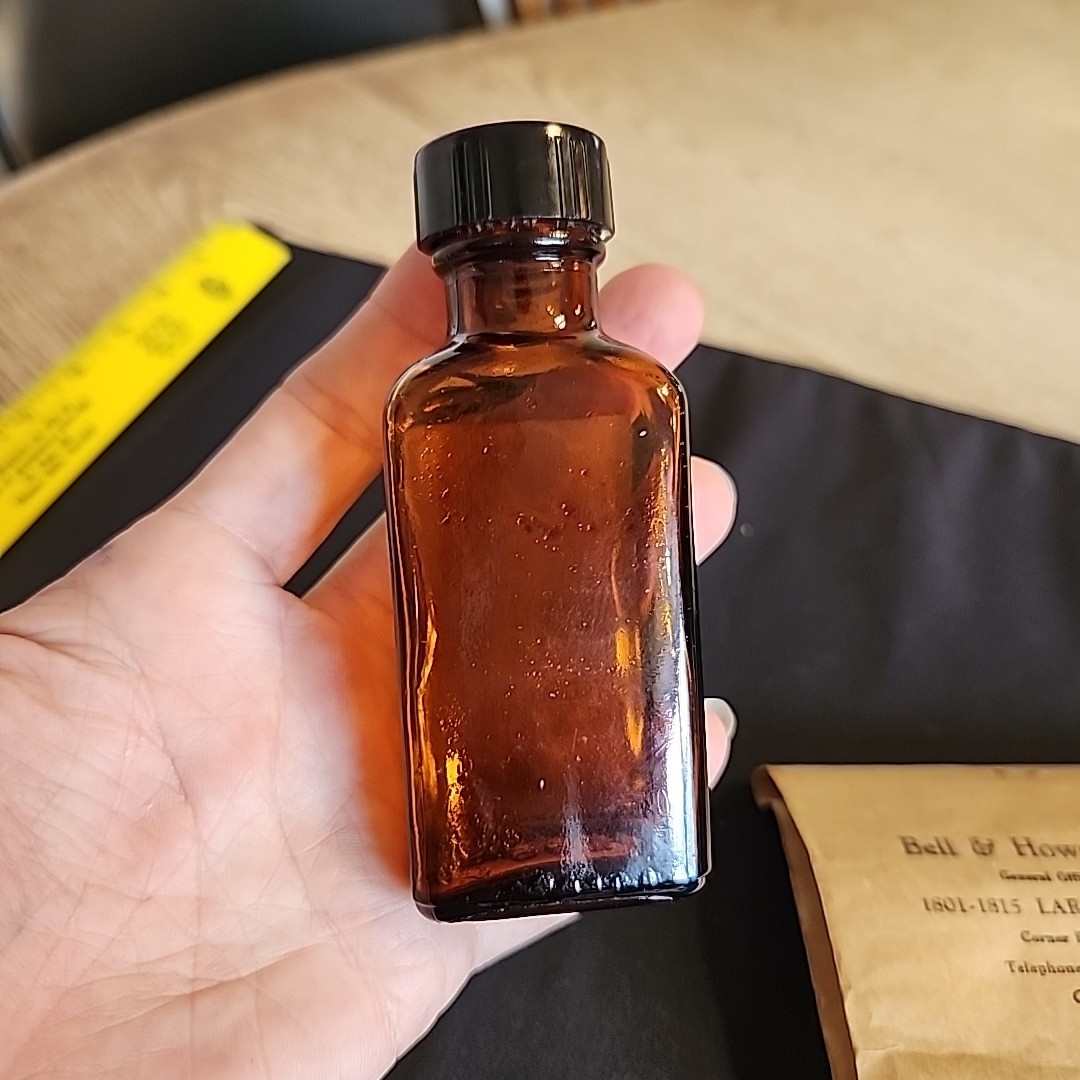 Vintage Bell & Howell Memorabilia Empty Bottle Of Opti-clean And Partial Tissue