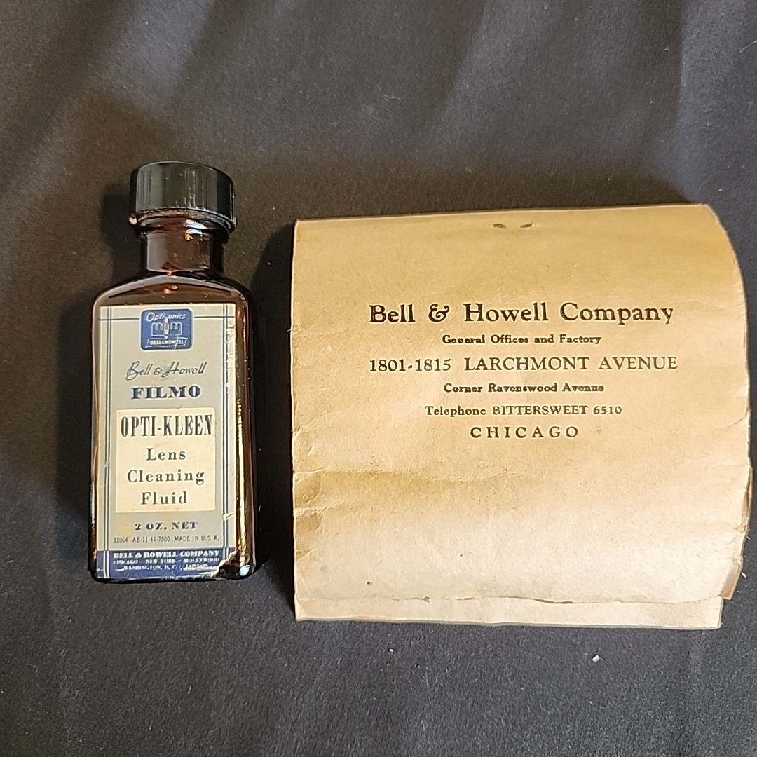 Vintage Bell & Howell Memorabilia Empty Bottle Of Opti-clean And Partial Tissue