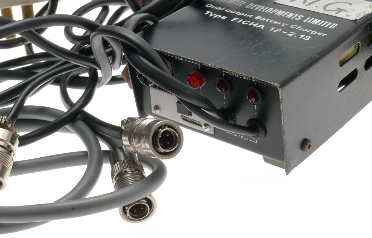 FILM TECH BATTERIES CHARGERS CABLES PARTS ASSORTMENT OF ITEMS RELATED TO FILM
