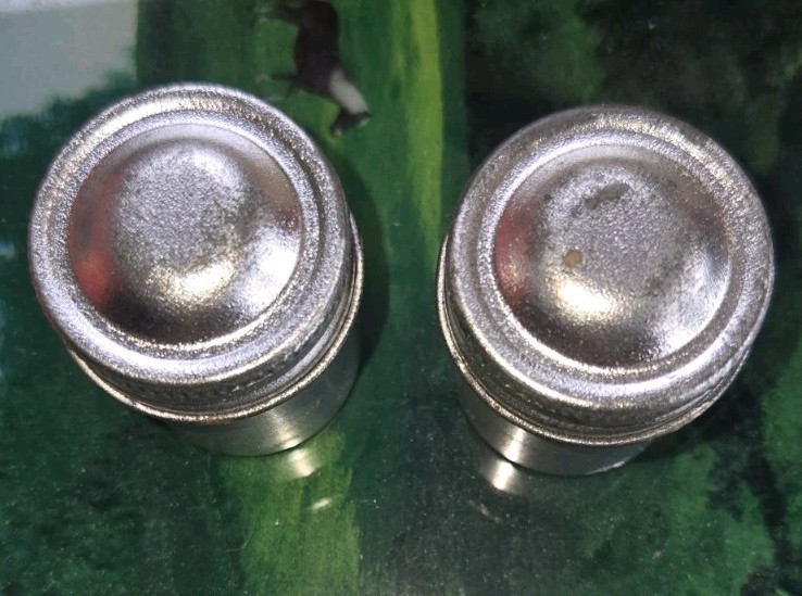 2 vintage aluminum film canisters
