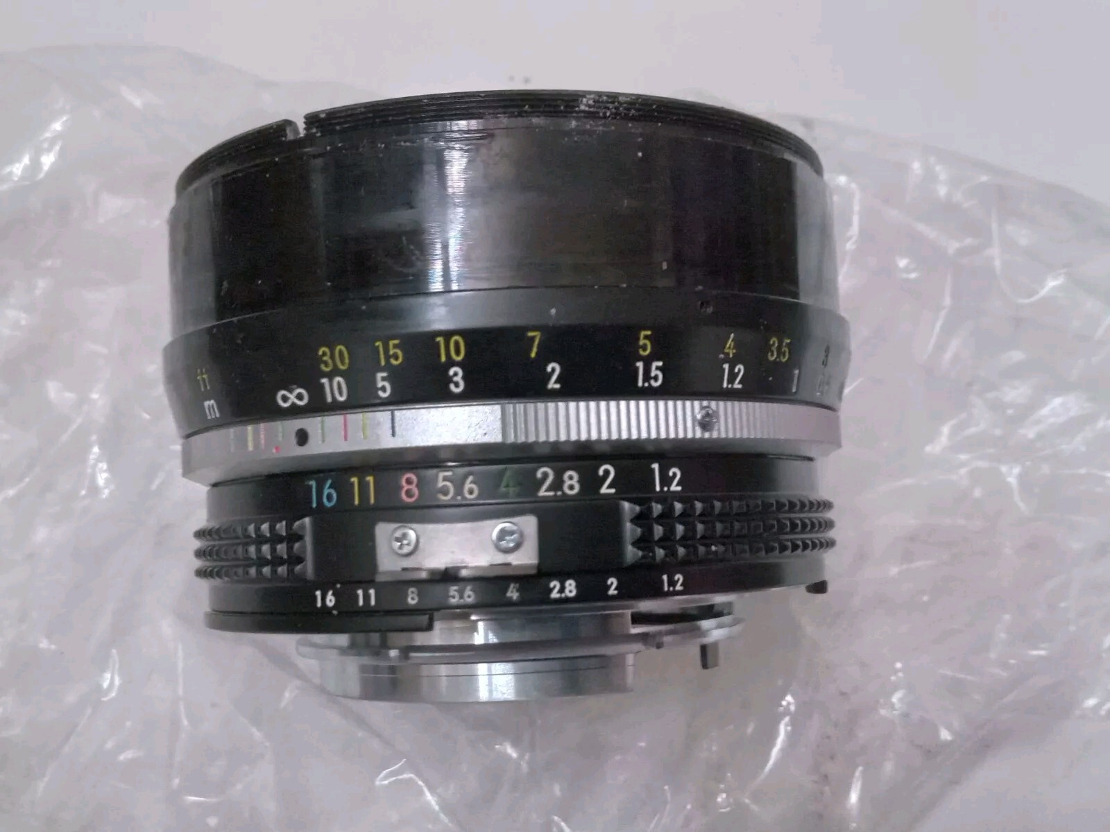 New Old Stock Aperture Control Mount, Helicoid Nikon 50 mm F1.2 Lens Spare Part