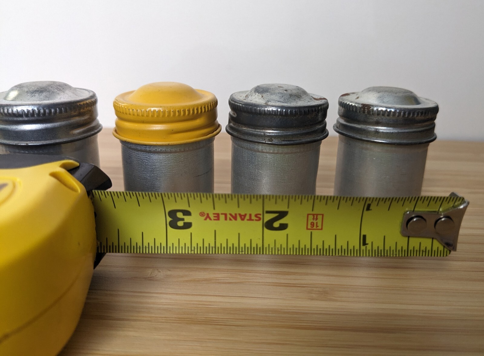 Four Vintage 35mm aluminum film canisters unbranded W/ metal top