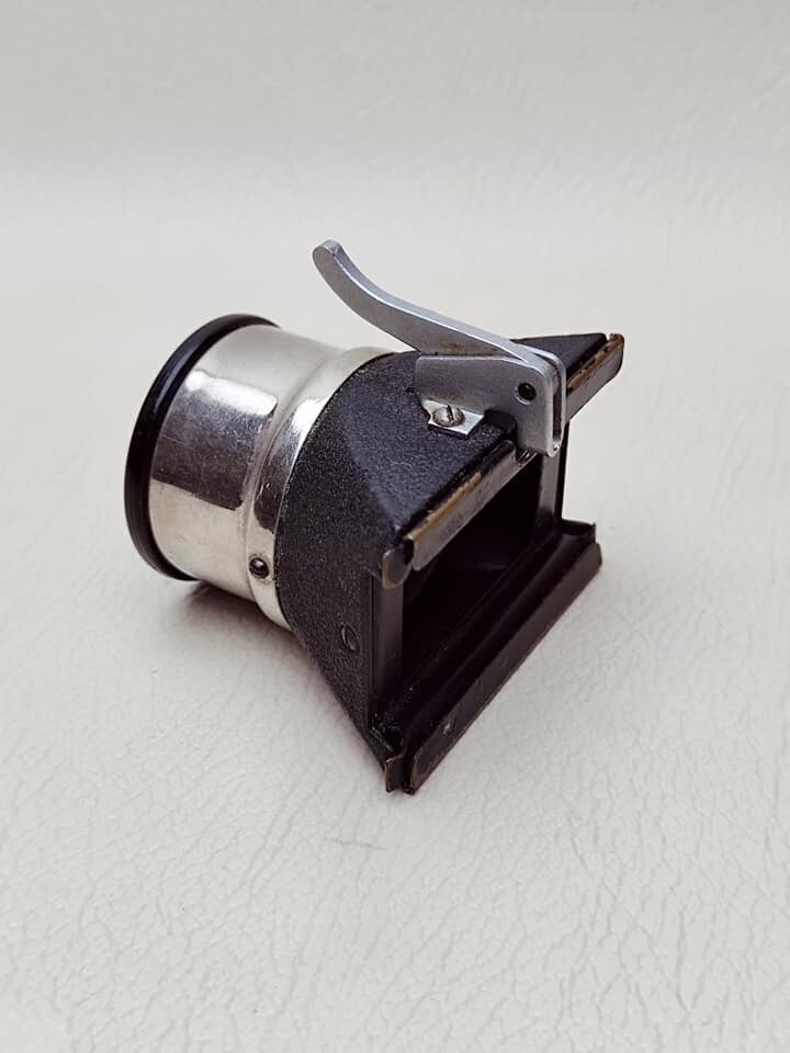 Magnifying glass for viewing 35 mm film photo, made in USSR