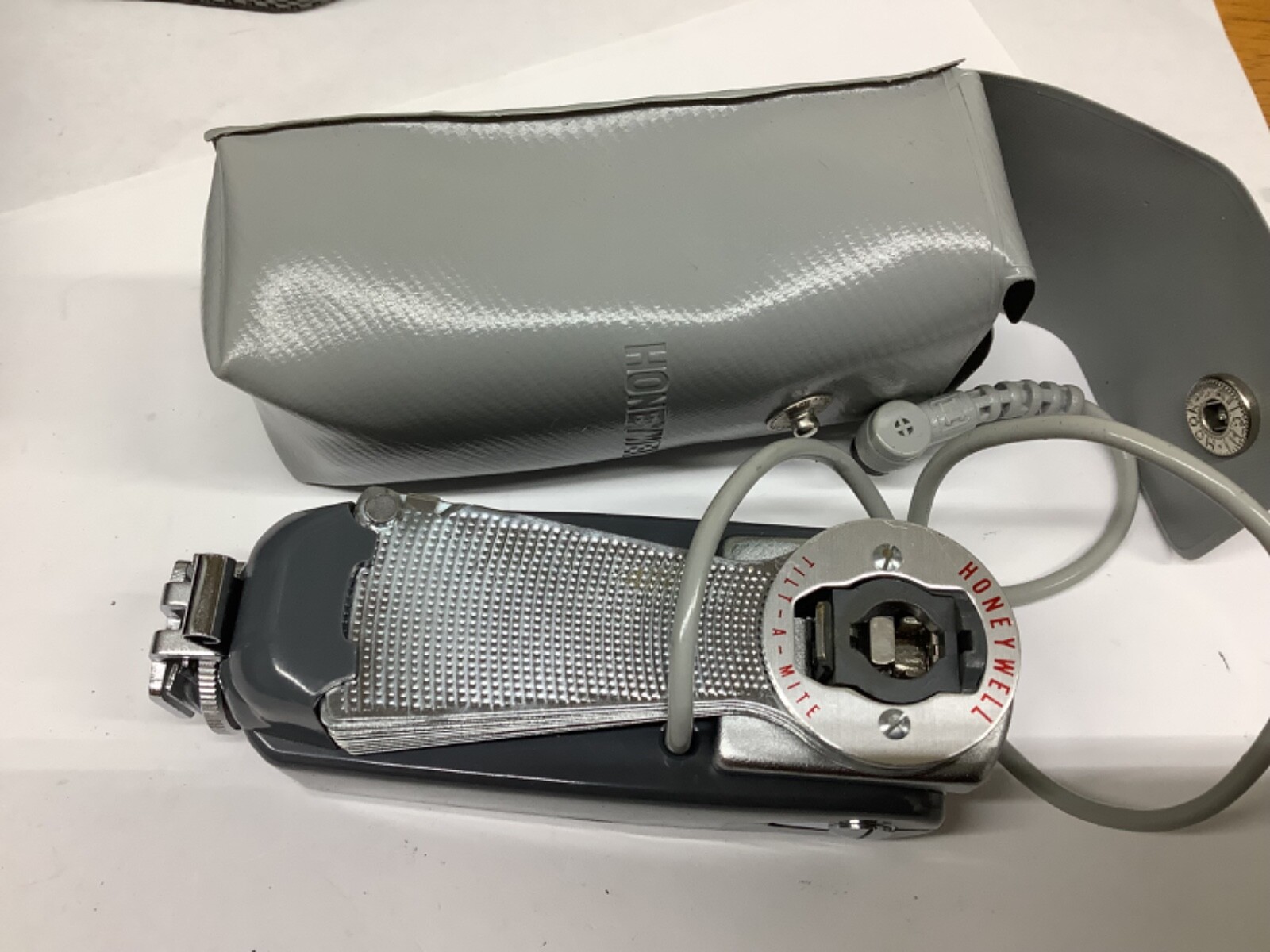 Honeywell Tilt-A-Mite Camera Flash Unit with case.