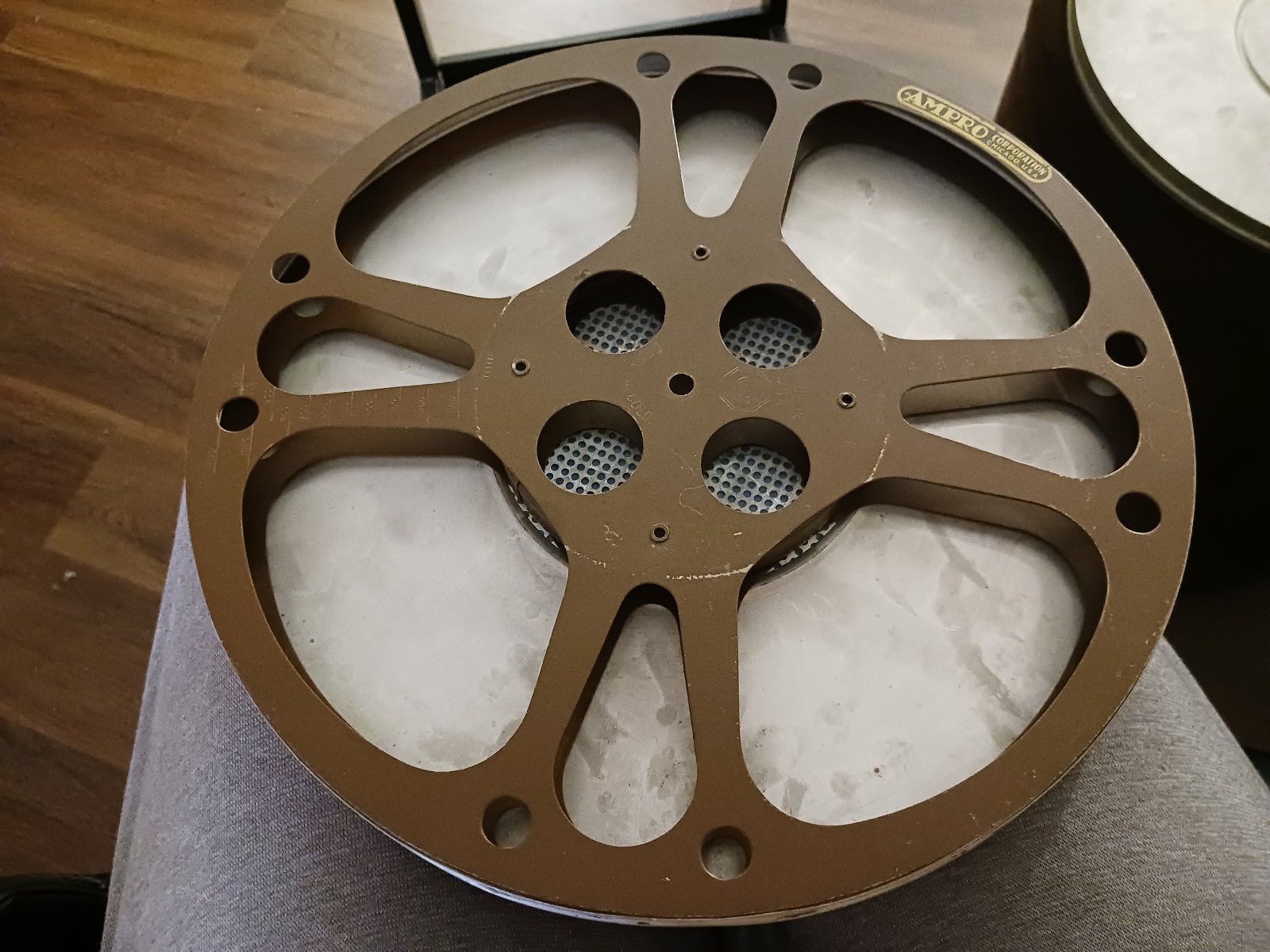 VINTAGE ANTIQUE BELL HOWELL 16MM FILM CANISTER AMPRO REEL