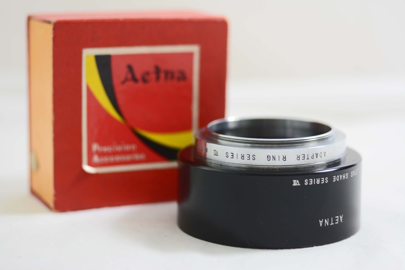 VINTAGE AETNA SERIES VII METAL CAMERA LENSHOOD WITH 49MM ADAPTER RING (MINT)