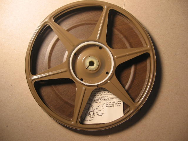 vintage Harwood 8mm reel & can 7″