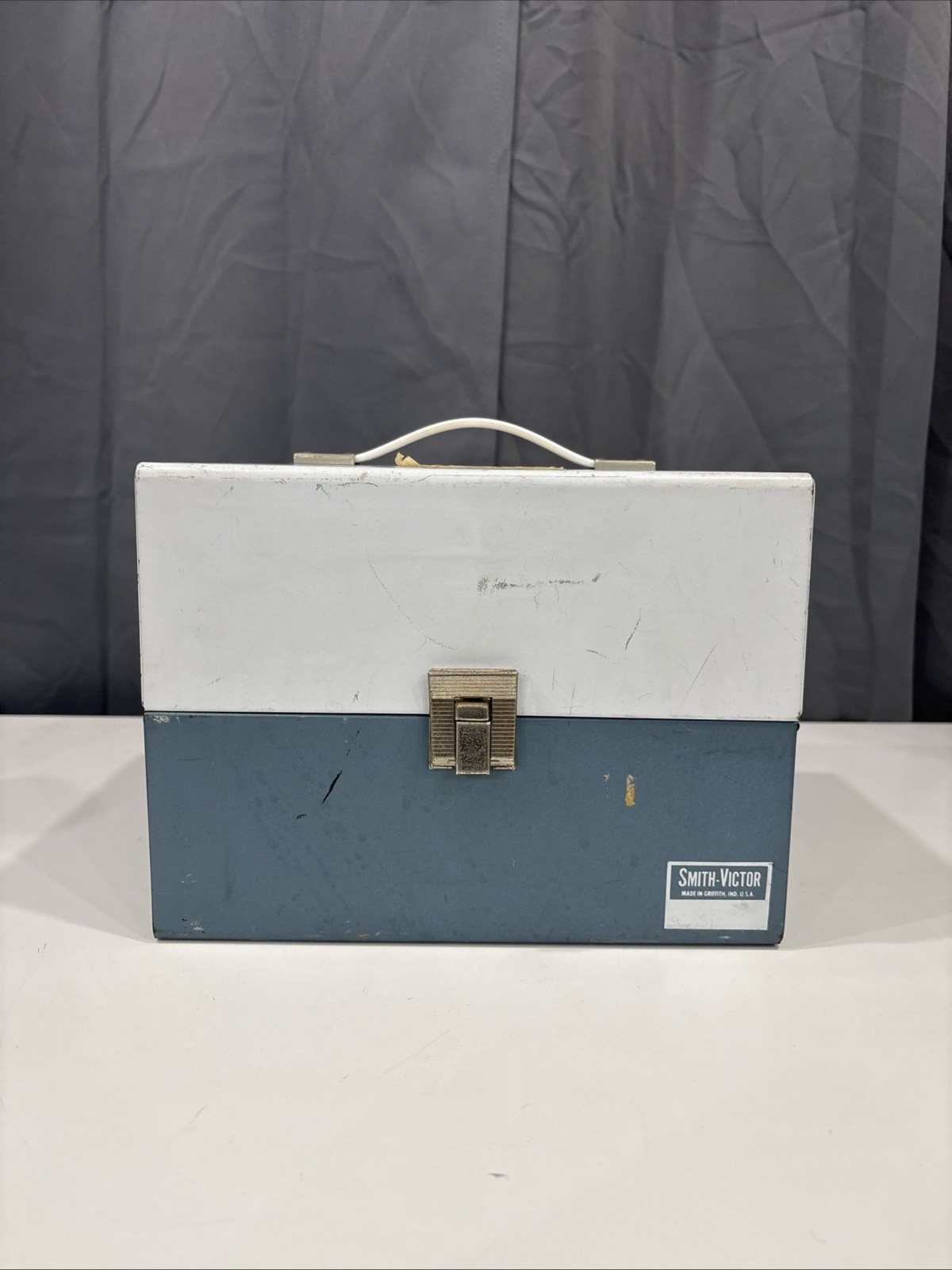 13 vintage 8mm film reels with 12 canisters and carrying case. No Film.