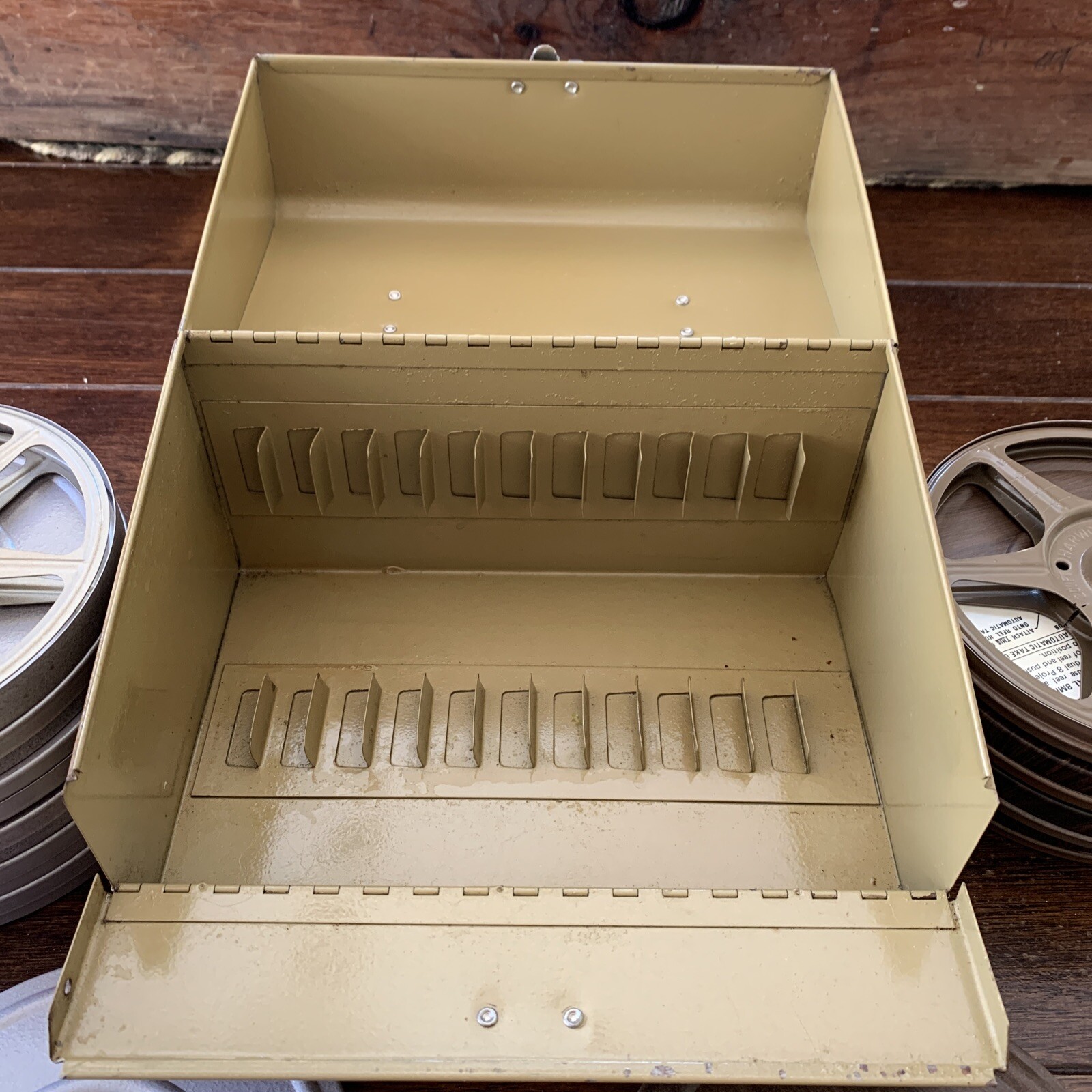 Vintage 8mm Film Set With 12 Slot Metal Case And Reels In Very Good Condition.
