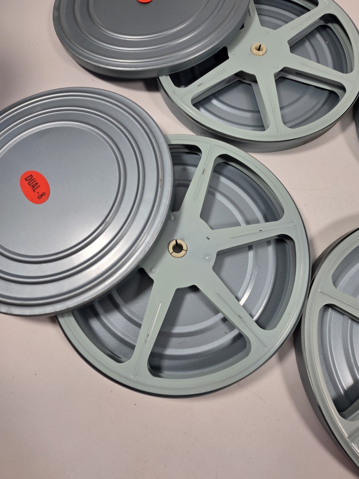 Set Of 4 Vintage Dual-8 8mm 7 in metal reel and can Old School Tv Nostalgia