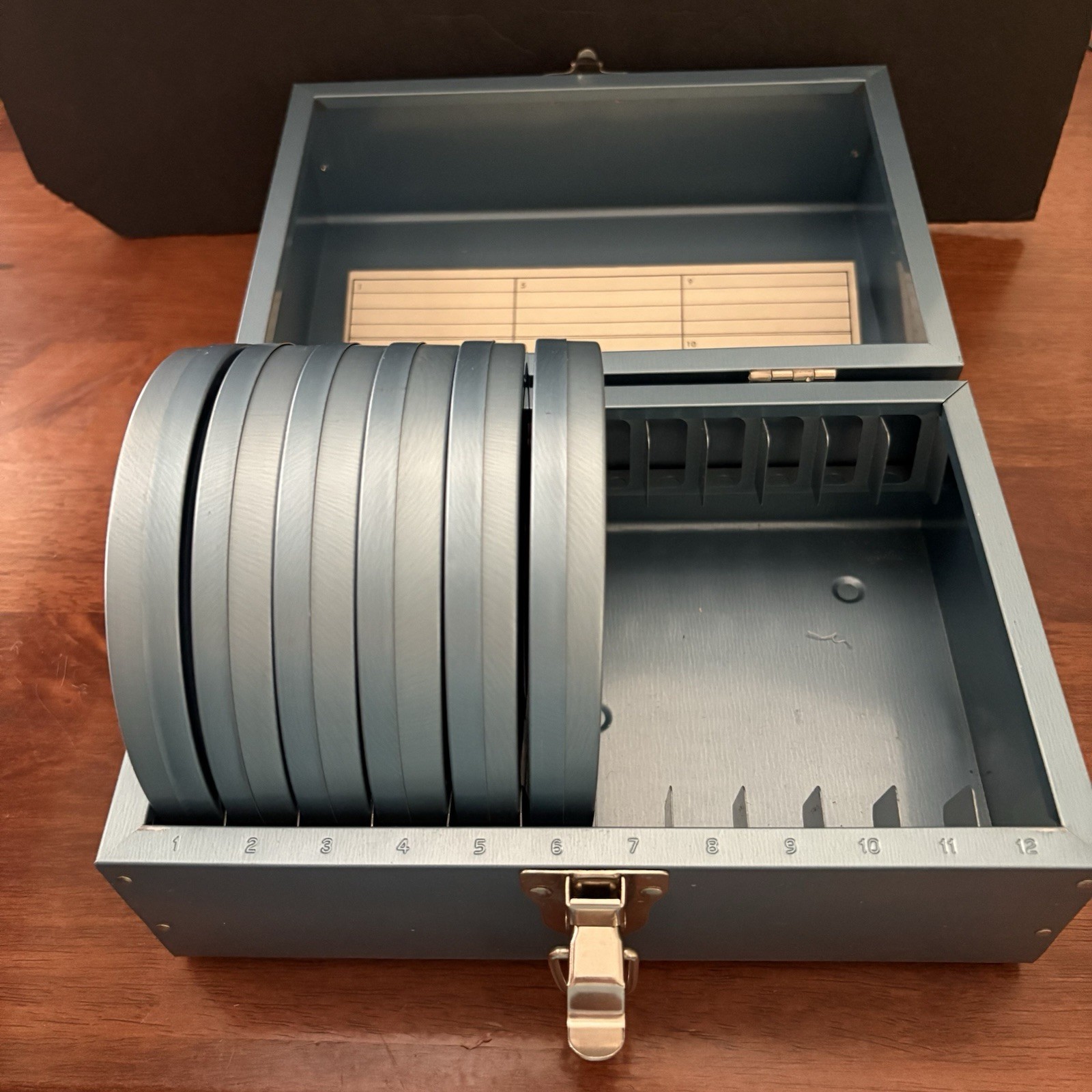 Vtg Blue Metal 8MM Film Case for 5″ Reels – Includes 6 Adams Canisters & Reels