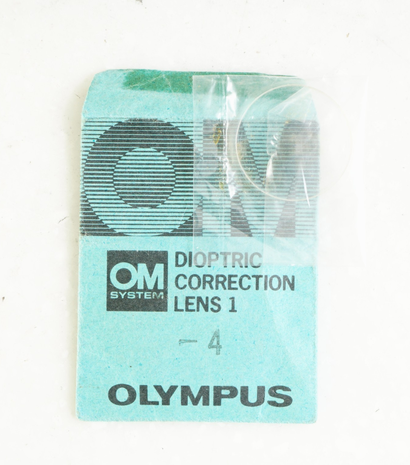 – OLYMPUS OM SYSTEM DIOPTRIC CORRECTION LENS 1 (-4) FOR OM-1(N), OM-2(N)