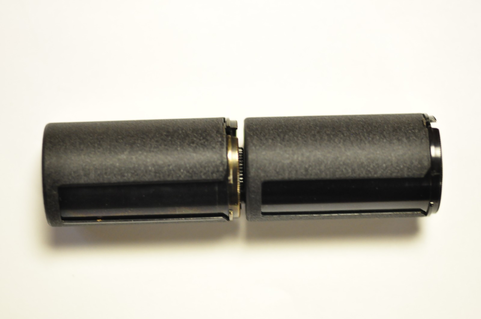 2-Nikon 35mm reloadable film cassette as shown. Two different. See images.