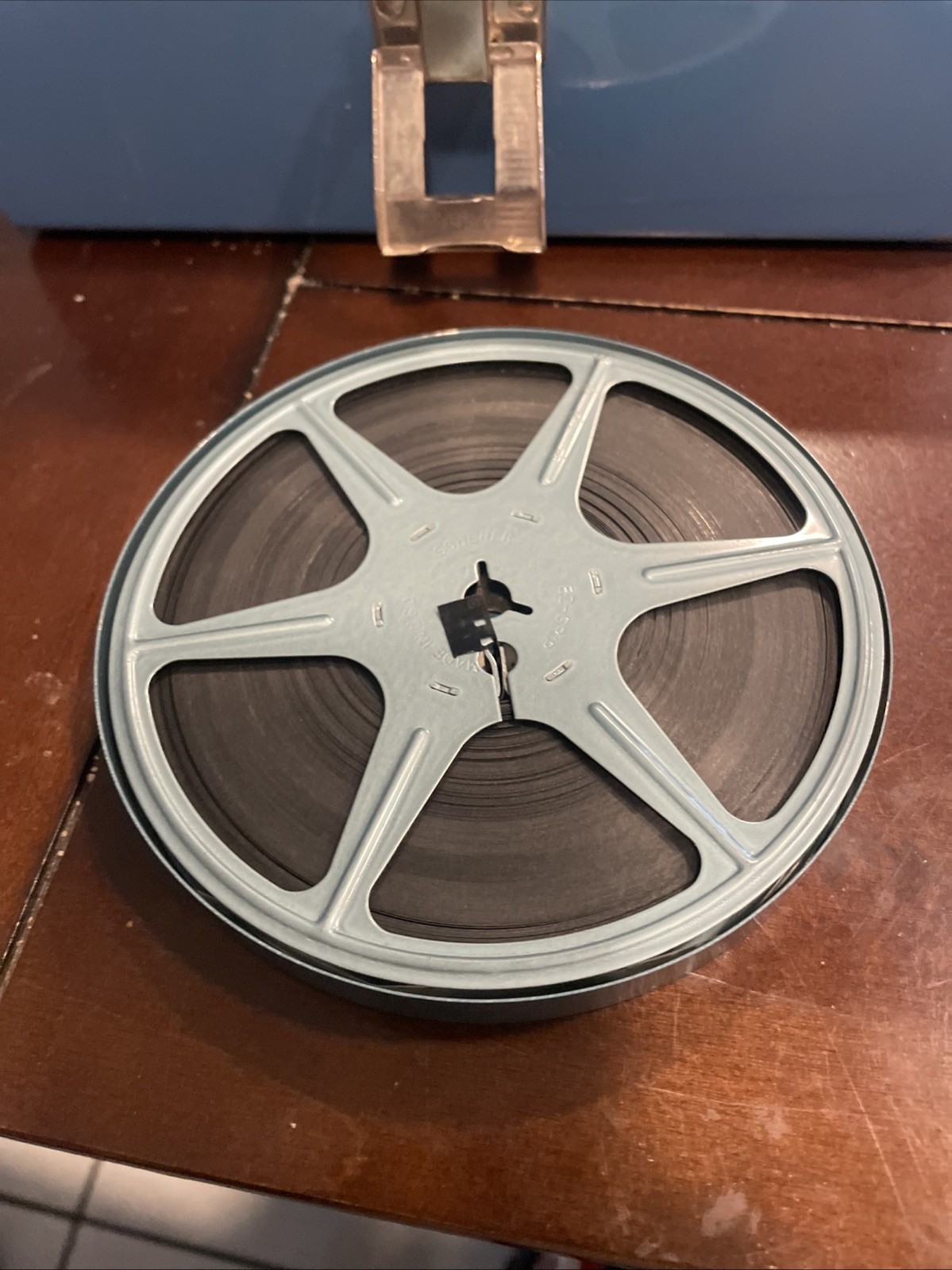 7 Vintage 5″ Metal Regular 8mm Movie Reels in Metal Cases with Metal Carry Case