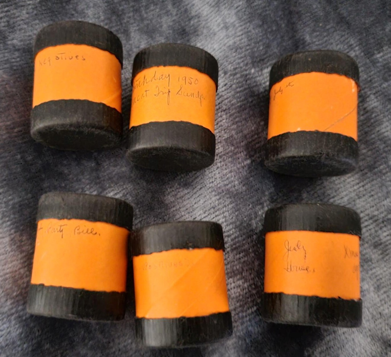 Vintage 35 mm film canisters-leather, metal and paper
