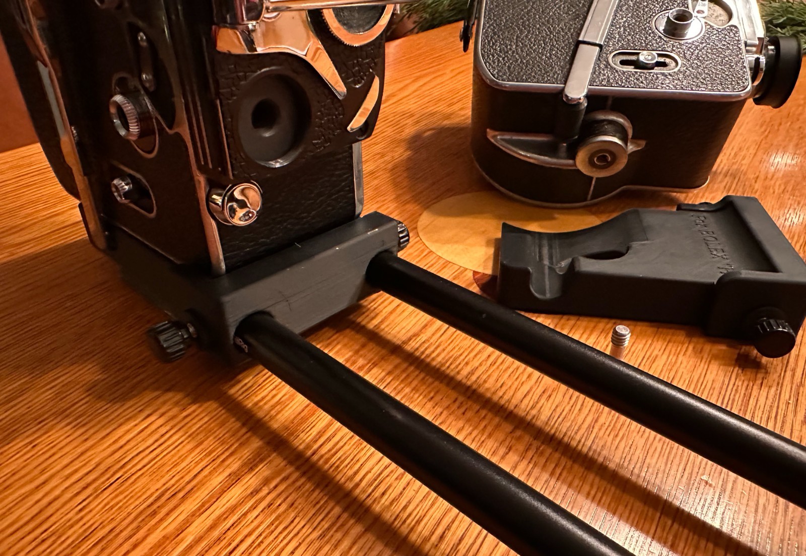 Bolex Saddle for 15mm Rods 60mm on Center – for “REX1 2 or 3” Round Base Cameras