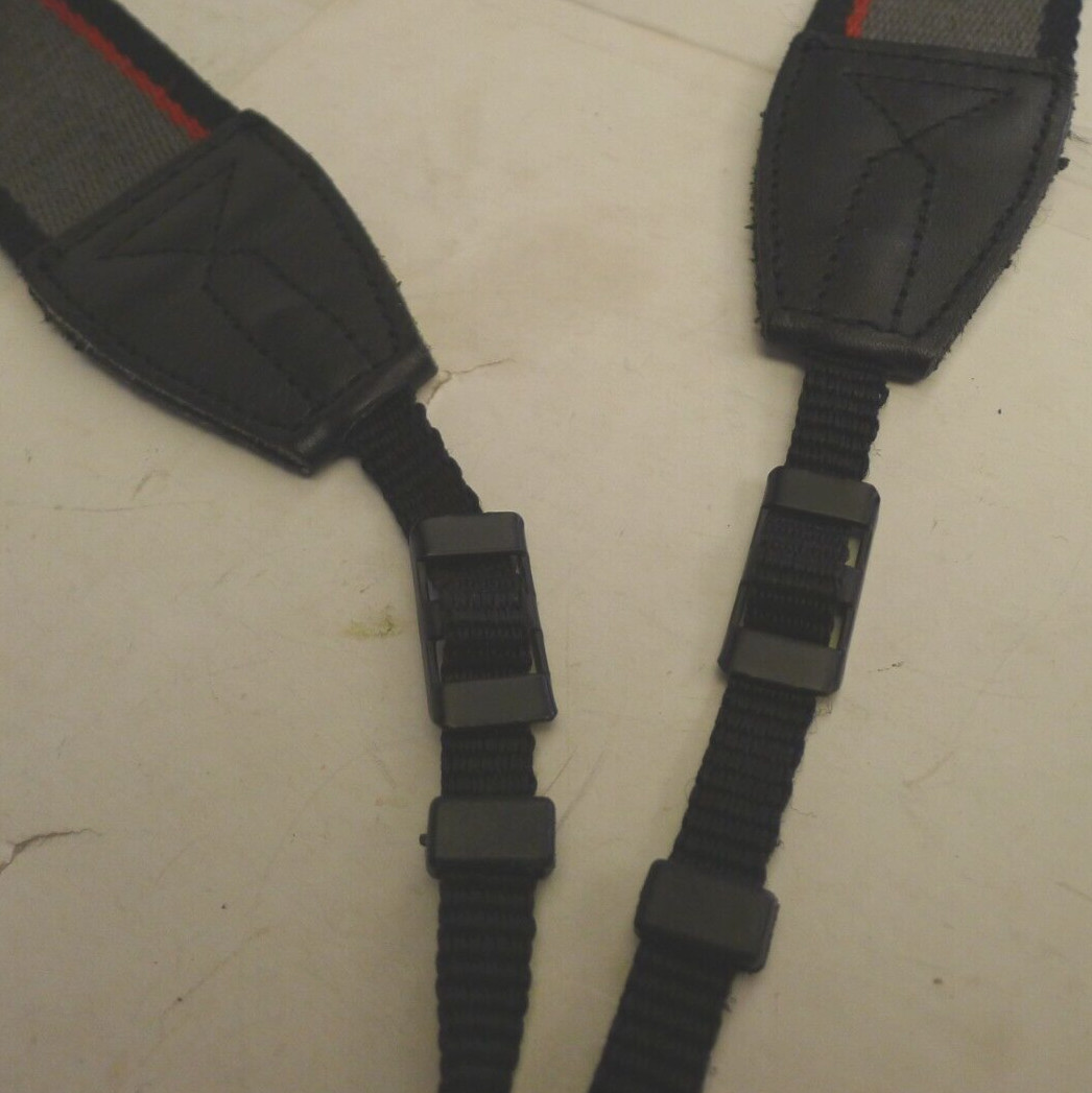Nikon 1 1/2″ Wide Camera Neck Strap – Grey w/Red Stripe Yellow Logo -Gently Used