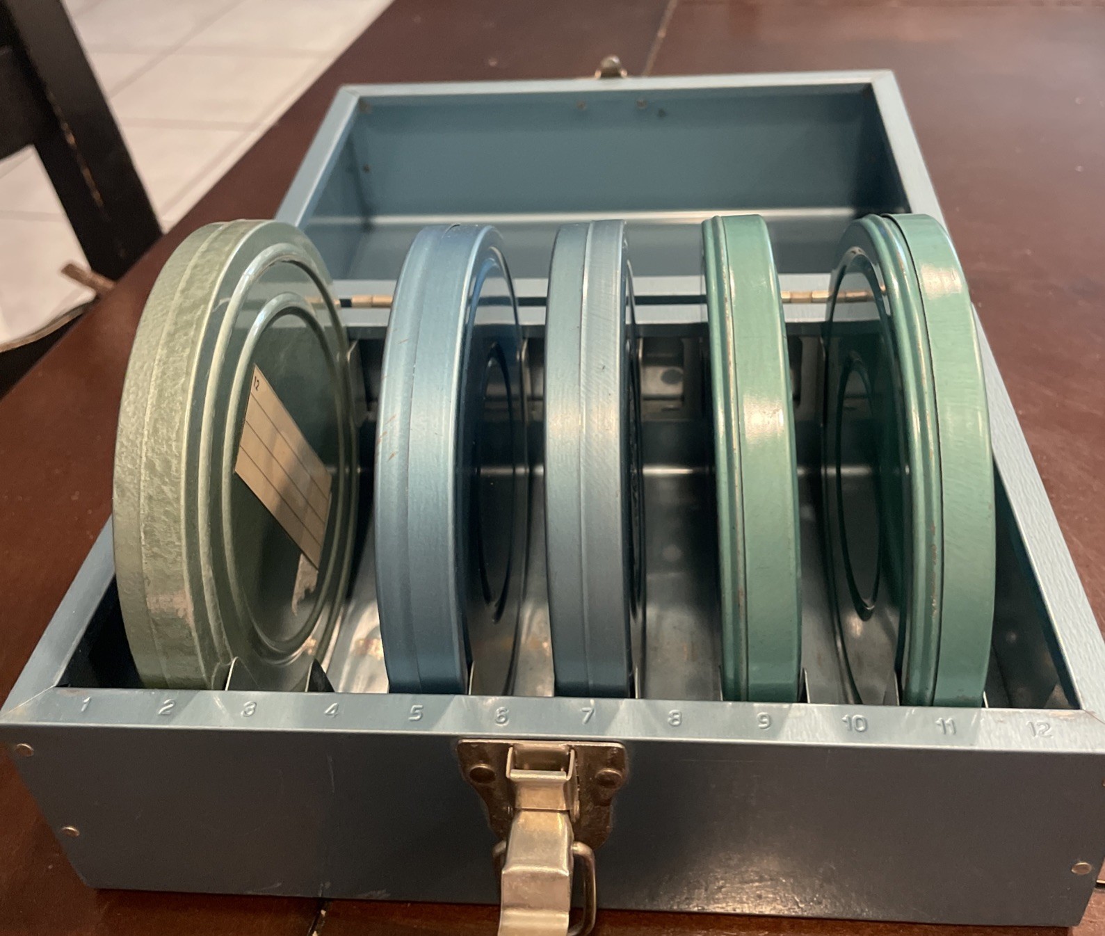 5 Vintage 5″ Metal Regular 8mm Movie Reels in Metal Cases with Metal Carry Case