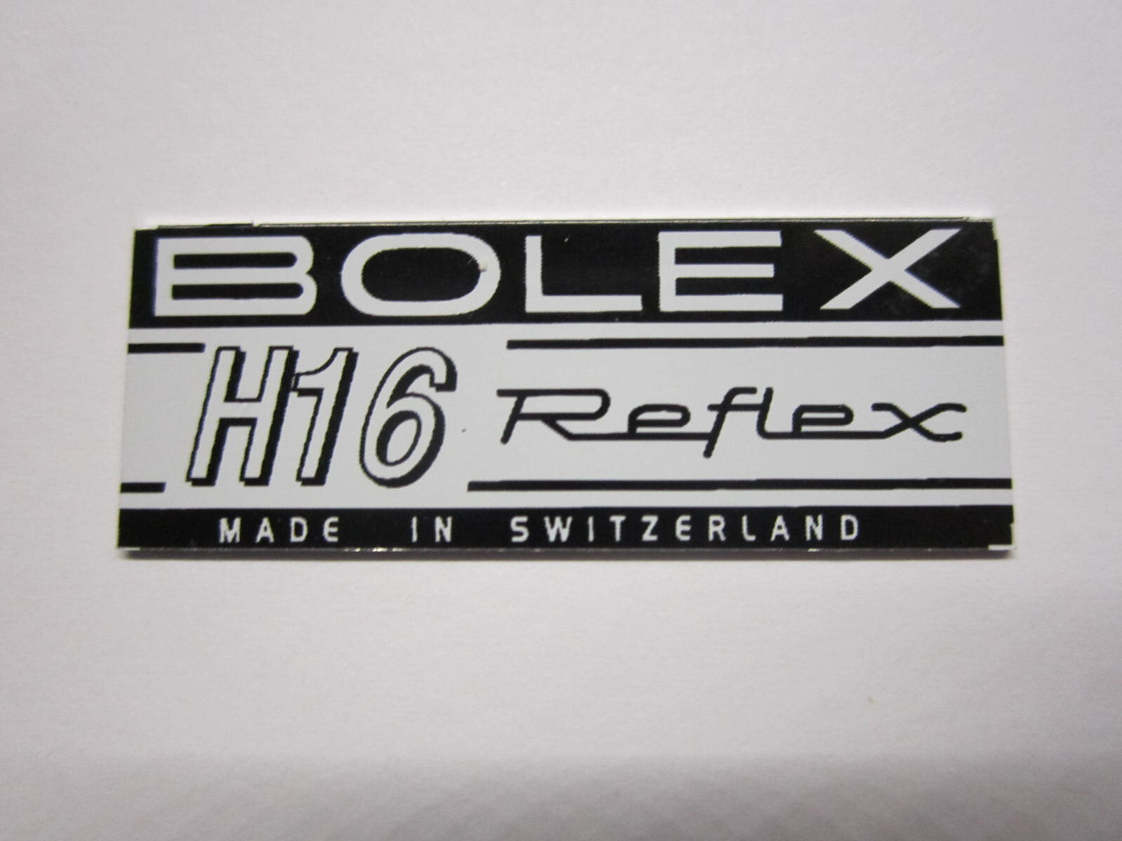 ‘BOLEX H16 REFLEX LOGO PLATE BADGE’ (Glue-In type) for BOLEX 16mm movie camera