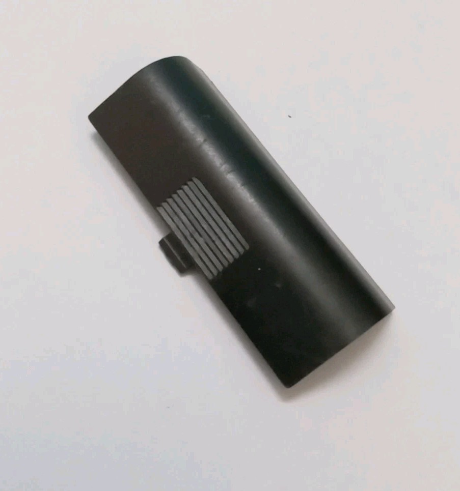 Olympus XA 1 Camera, A9M Flash Battery Door / Cap Original Used Spare Part.
