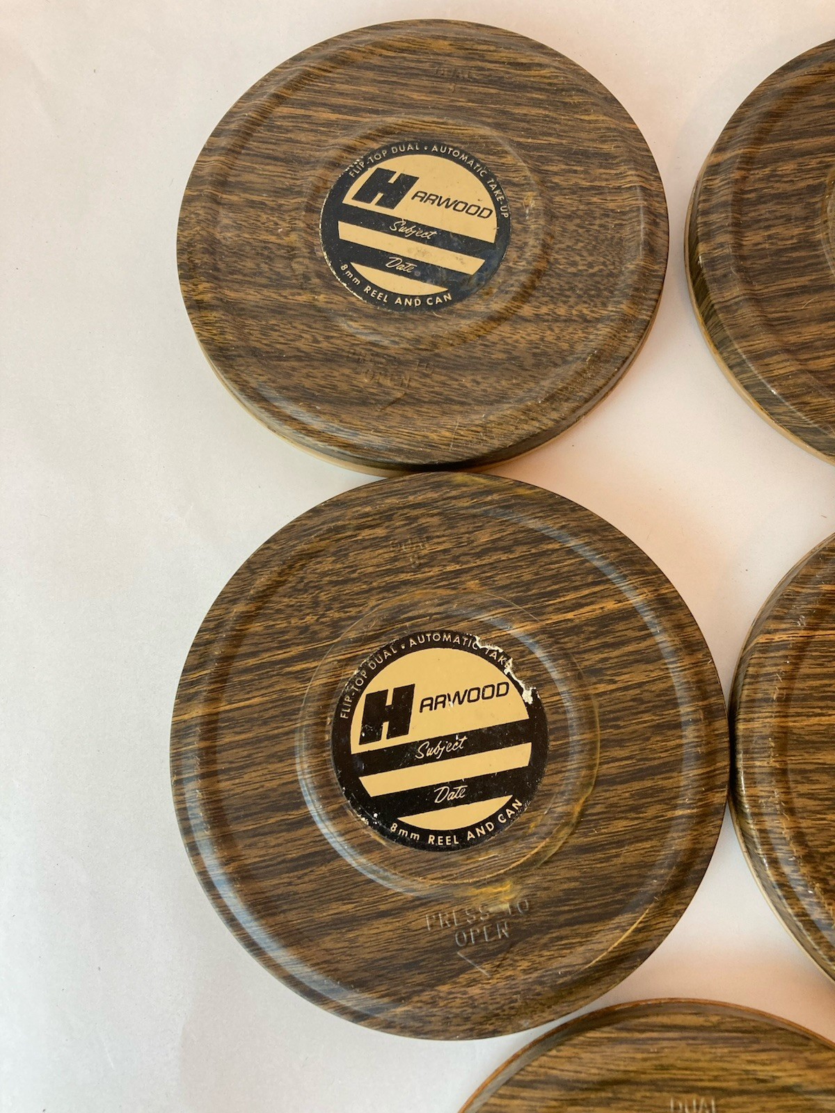 Set of 8 8mm Film Reel and Can Harwood See description