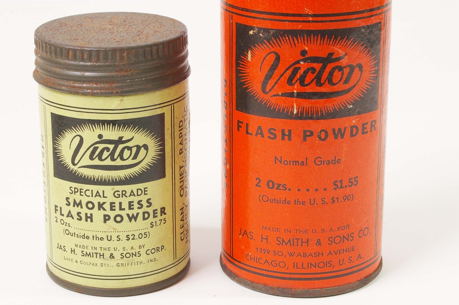 F97917~ Two Victor Flash Powder Cans With Bottles – Empty – J.H. Smith & Sons