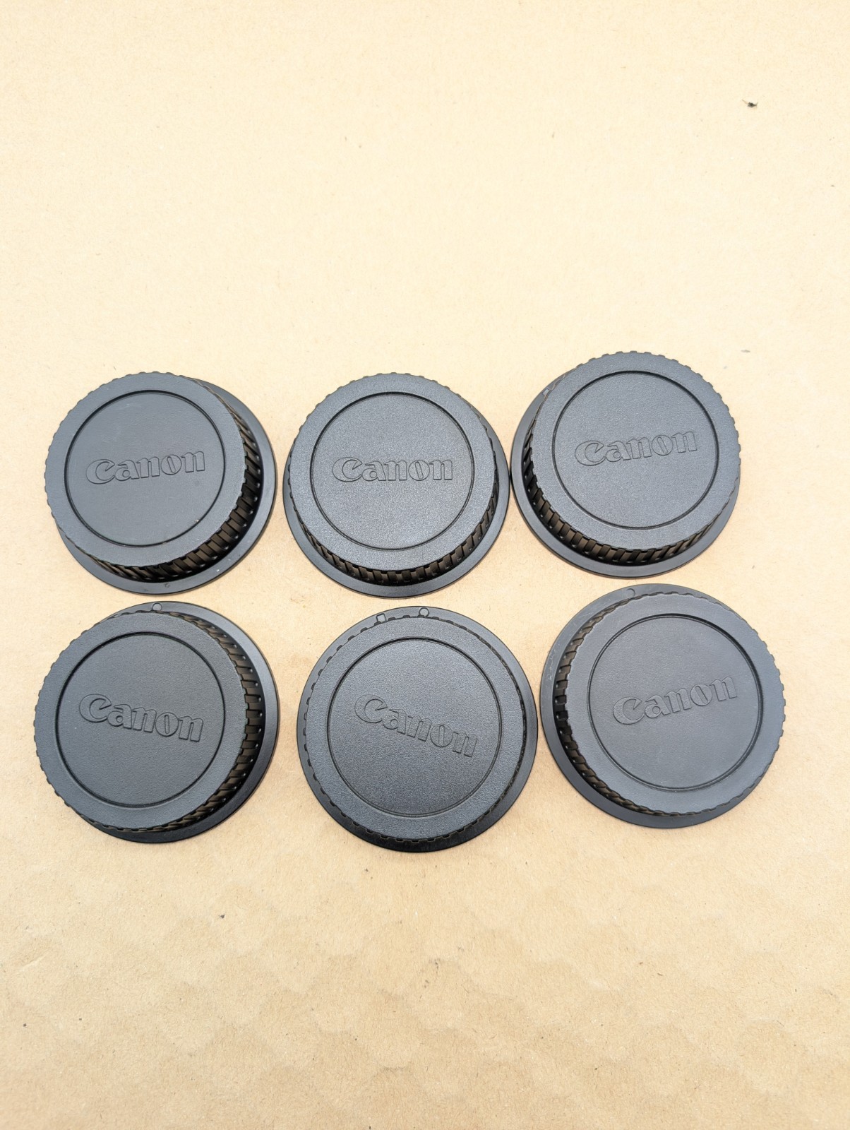 6 Misc. Canon Branded Lens Caps Replacement Camera Parts. Used.