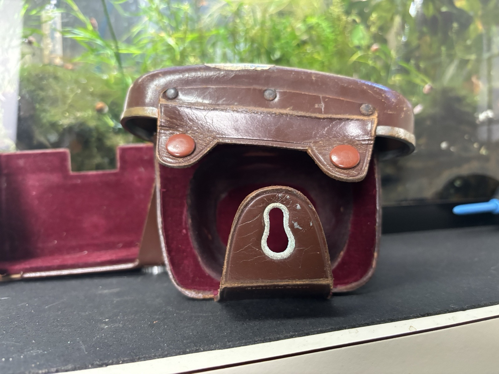 Vintage Brown Film Camera Case Made in Japan lots of wear and rust on metal.