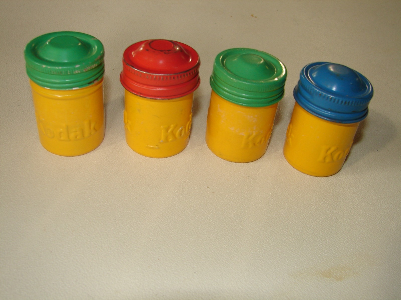 Kodak Metal Film Cannisters rare with Kodak embossed twice 4 yellow with diff co