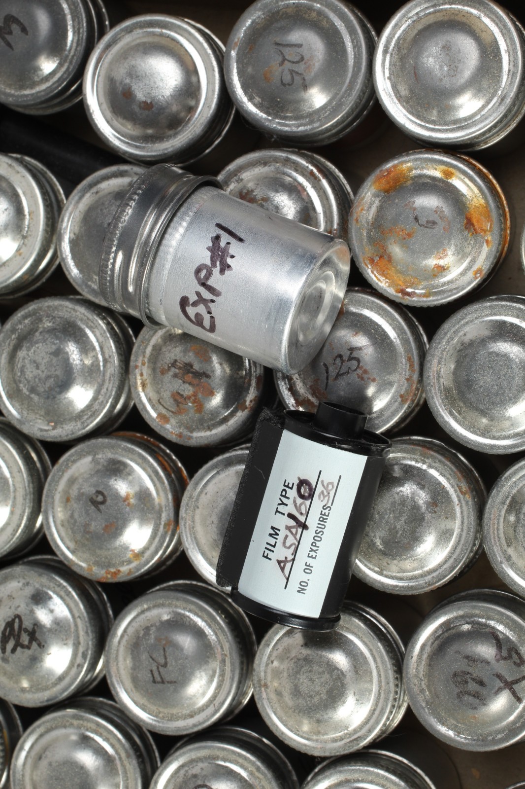 LOT OF 57 RELOADABLE 35MM CASSETTES W ALUMINUM FILM CANISTERS FUJI & AFTERMARKET
