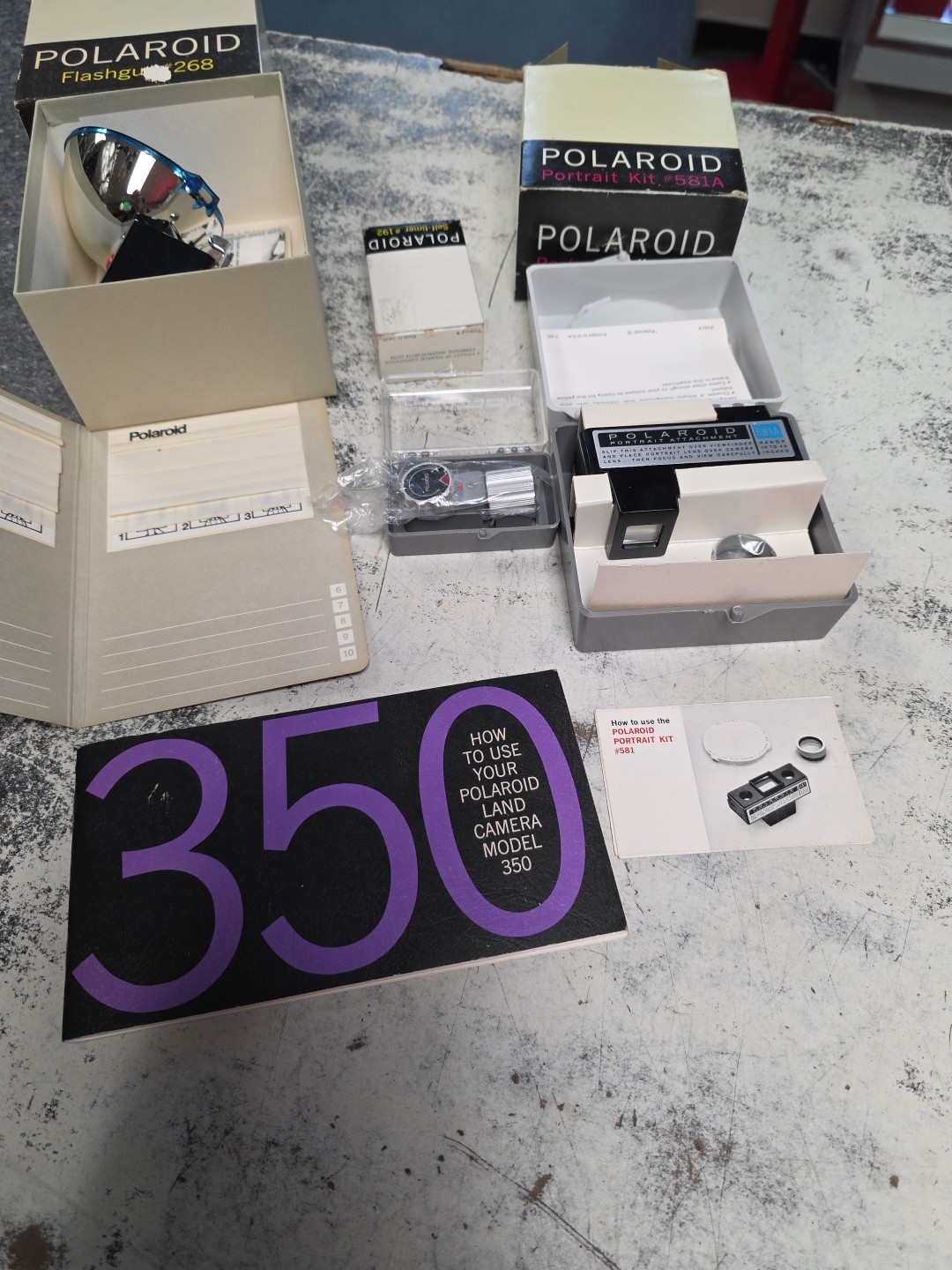 Polaroid 350 BOOK kit 581A flash 268 self timer 192 and accessory LOT No Camera