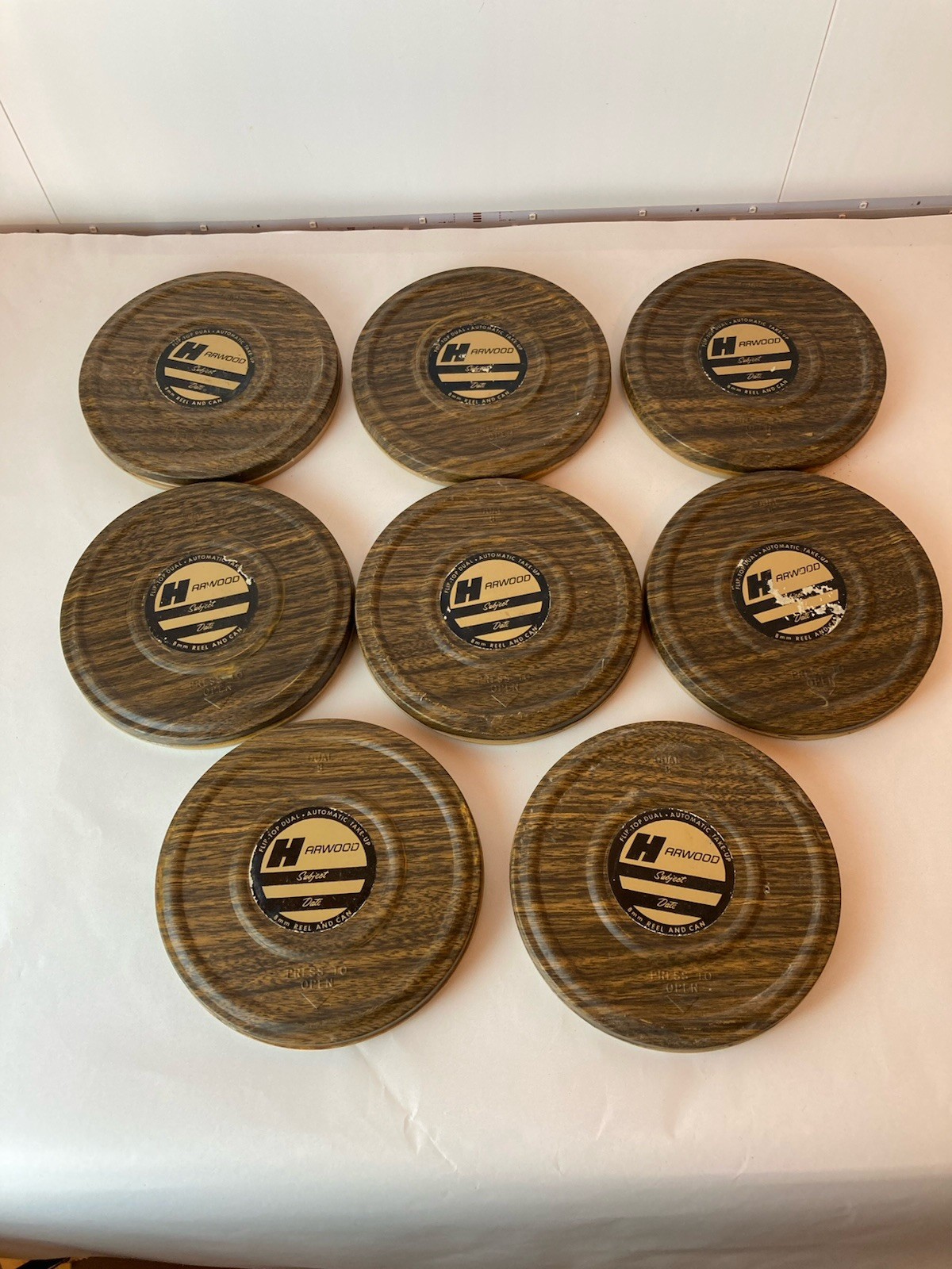 Set of 8 8mm Film Reel and Can Harwood See description