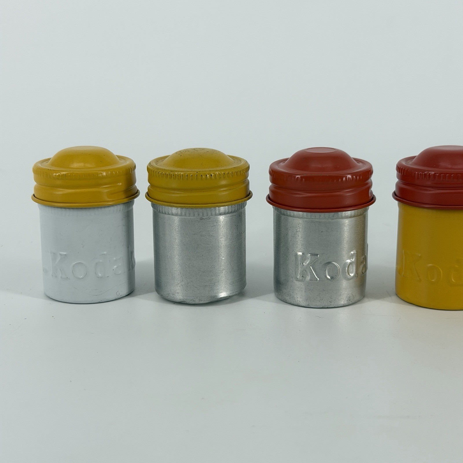 Lot of 7 Vintage Metal Kodak 35mm Film Canisters Yellow, Red, Silver