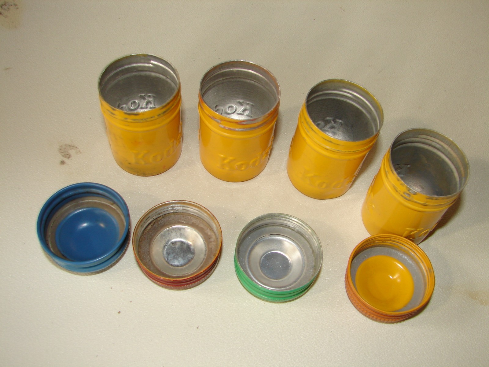 Kodak Metal Film Cannisters rare with Kodak embossed twice 4 yellow with diff co