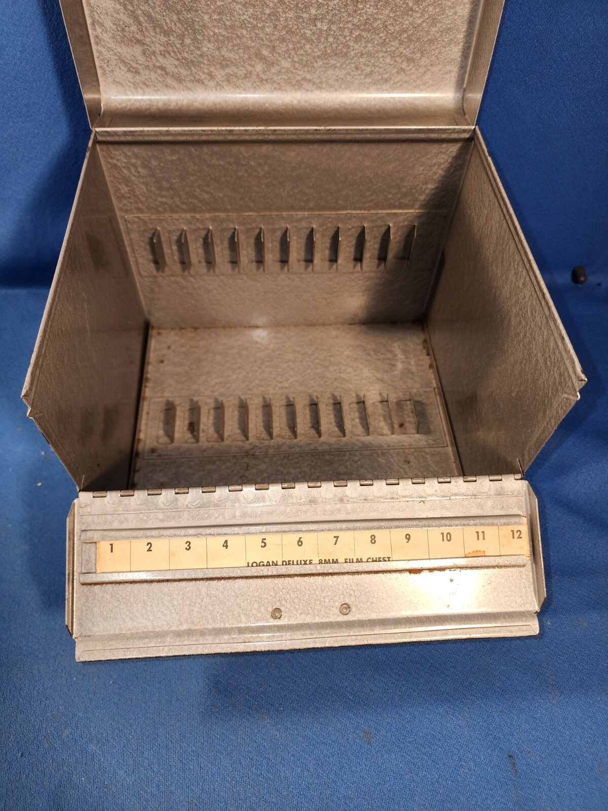 VINTAGE FILM CANS, REELS & LOGAN 12 SLOT CHEST – BLUE GRAY COLOR
