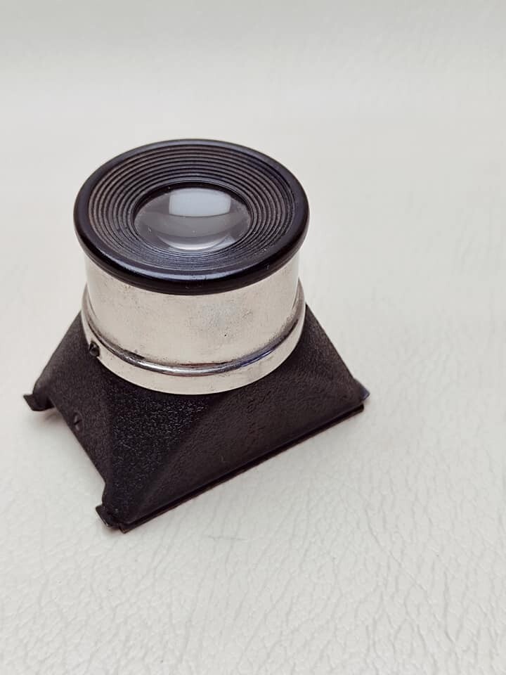Magnifying glass for viewing 35 mm film photo, made in USSR