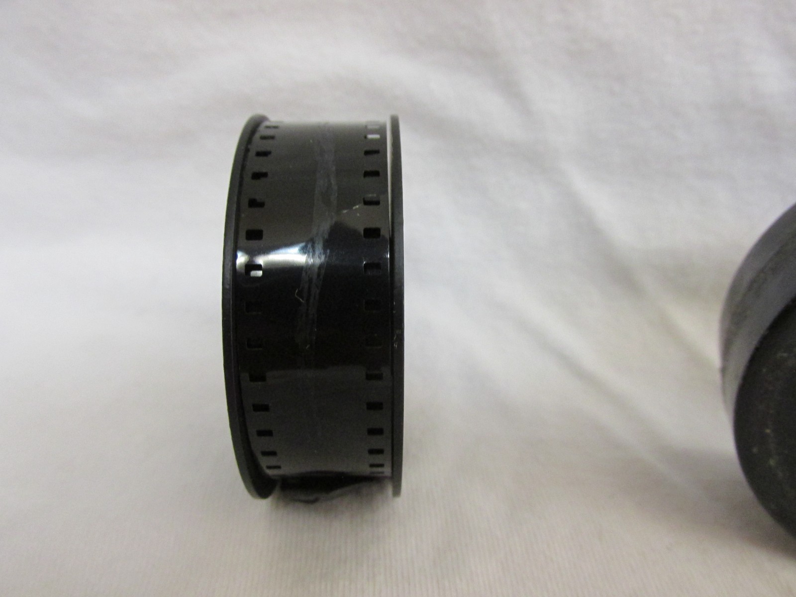 VINTAGE KODAK 16mm MOVIE FILM CANISTER WITH FILM INSIDE