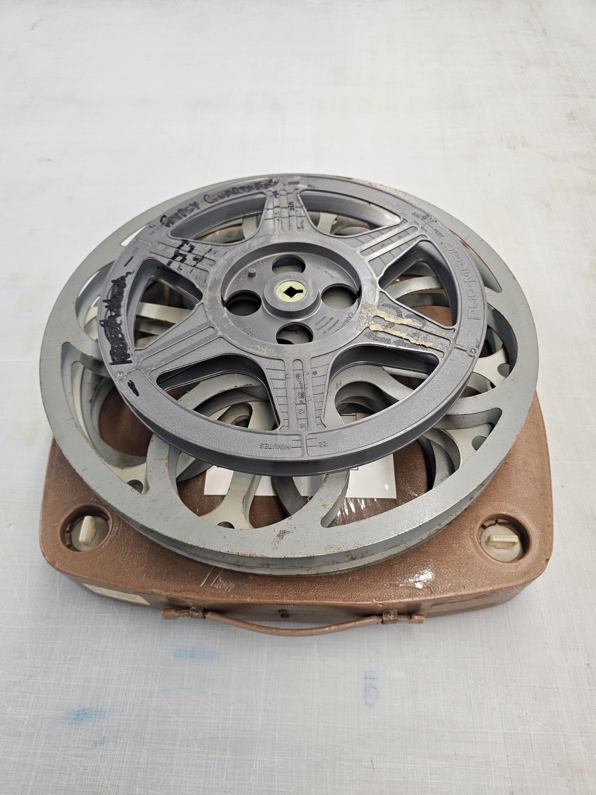 16mm film reels, metal, plastic, with 2-reel case gray, blue