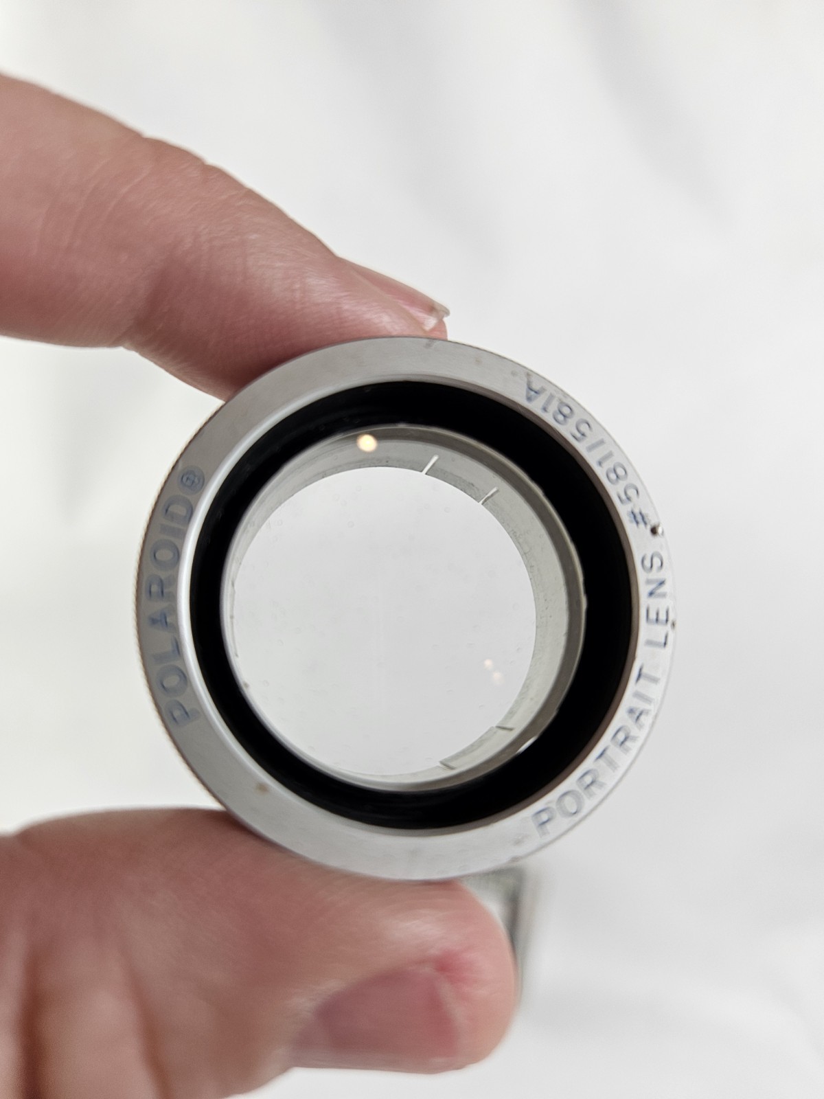 Polaroid Self-timer #192, Polaroid UV Filter #585, Portrait Lens #581 A