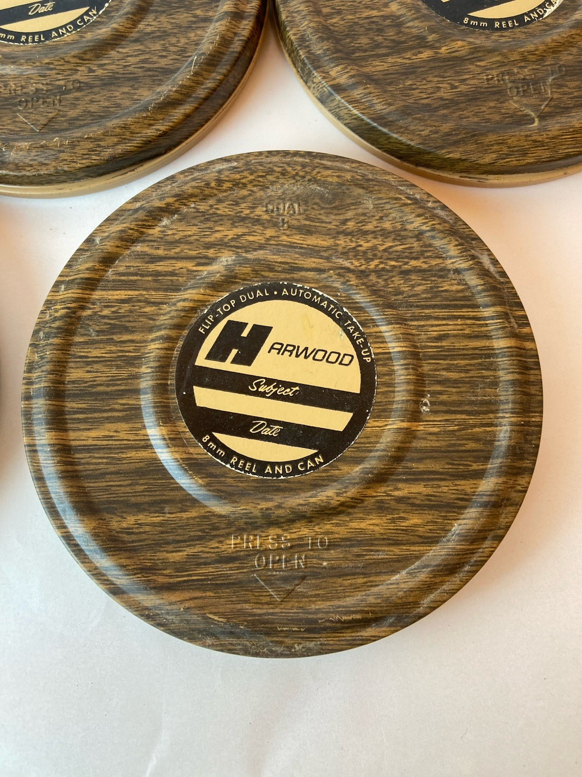 Set of 8 8mm Film Reel and Can Harwood See description