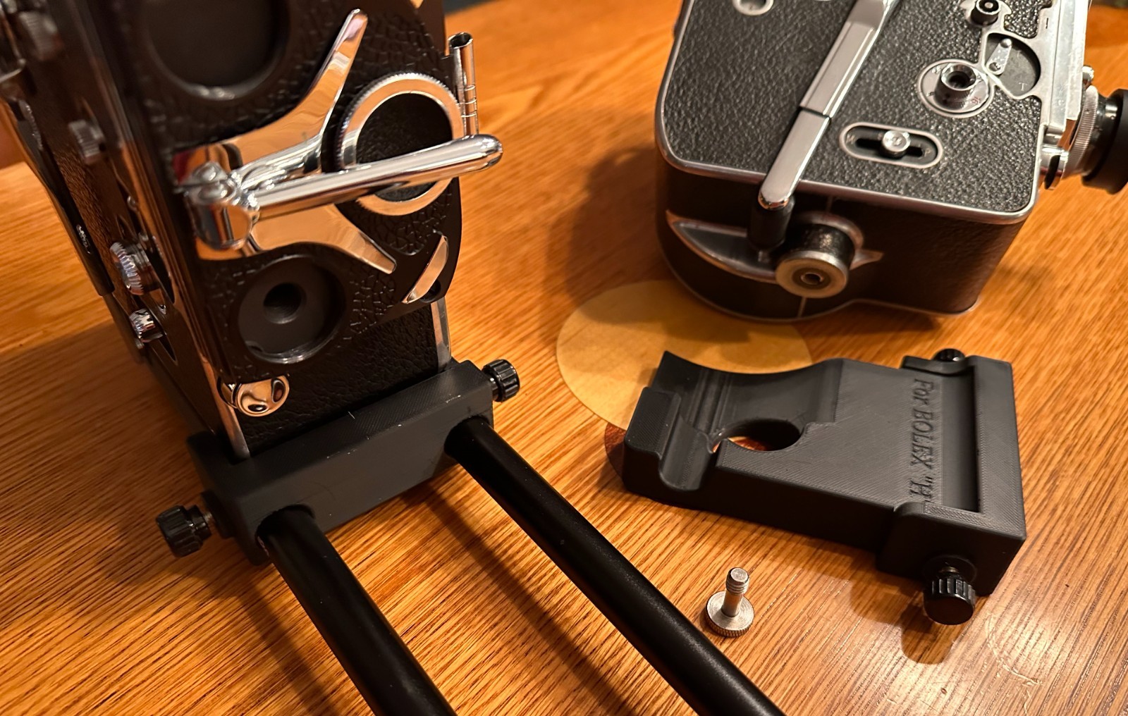 Bolex Saddle for 15mm Rods 60mm on Center – for “REX1 2 or 3” Round Base Cameras