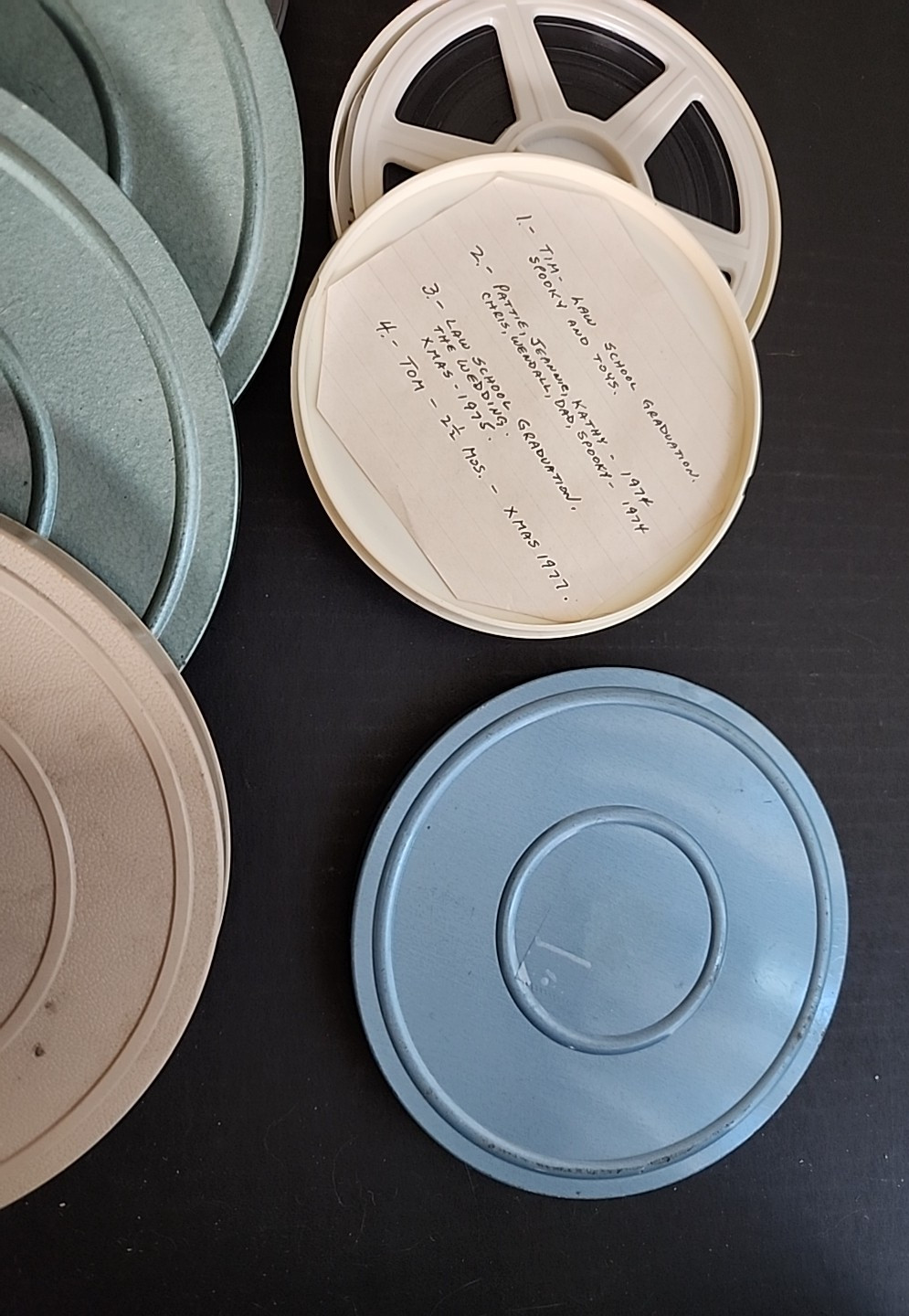 8 Lot Including Five 7″ Canisters for 8mm Film & 3 other various canisters/reels
